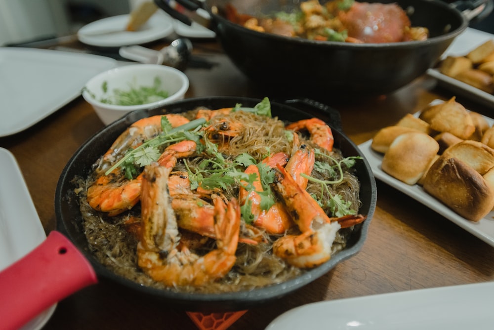 cooked food on black ceramic bowl