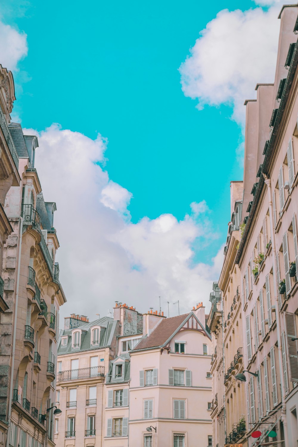 white and brown concrete buildings under blue sky during daytime