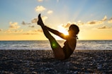 A beautiful sunset yoga session on a beach.