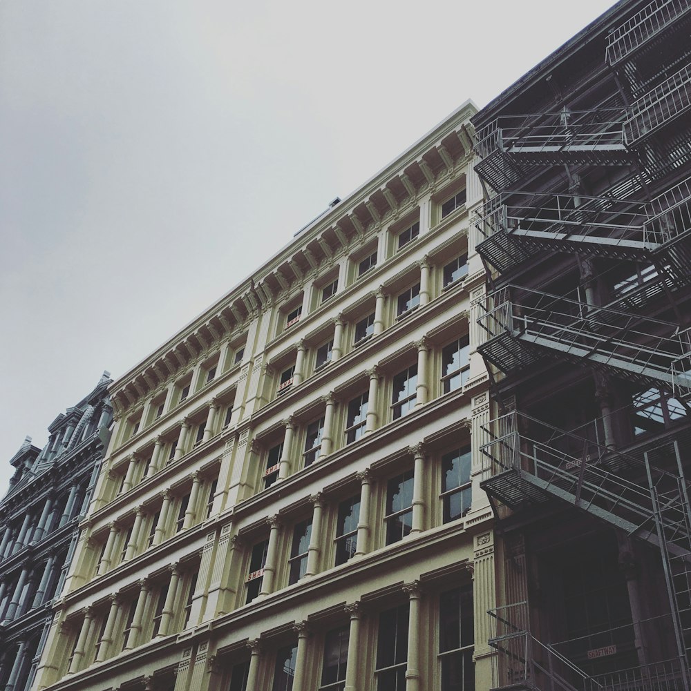 brown concrete building under white sky during daytime