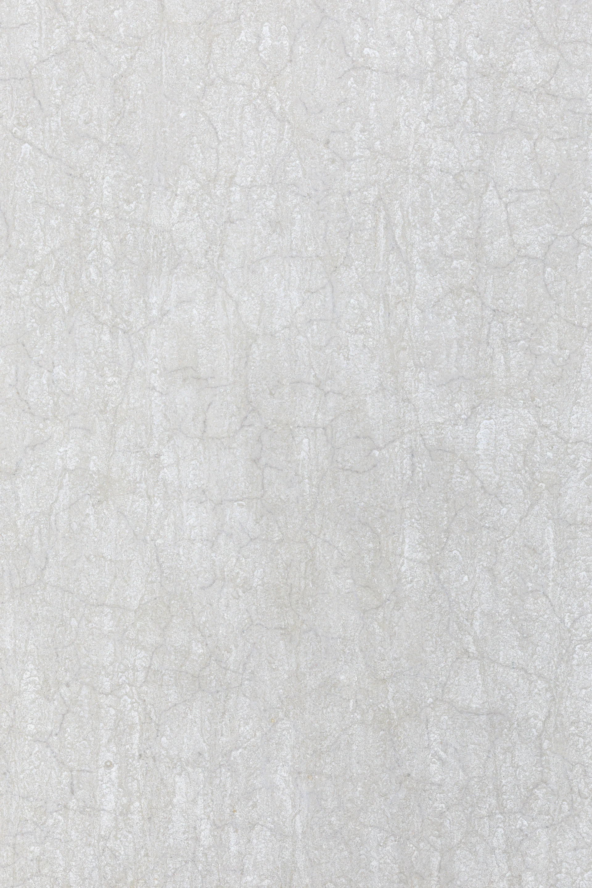 a white wall with a black and white clock on it