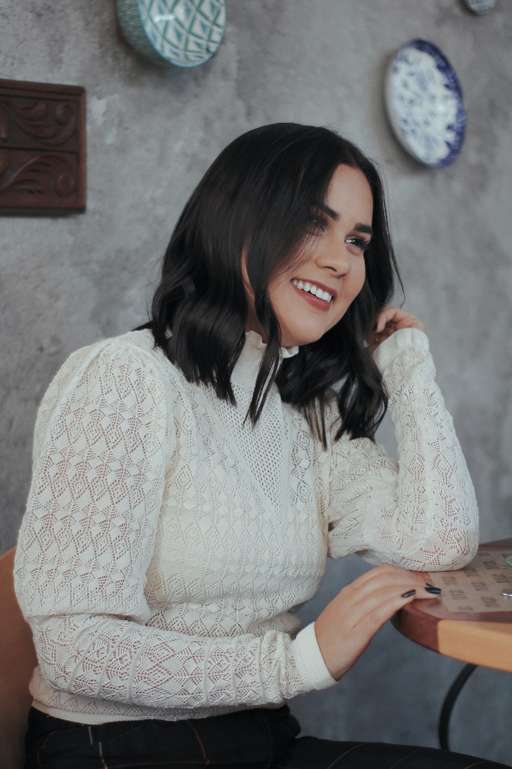 woman in white knit sweater