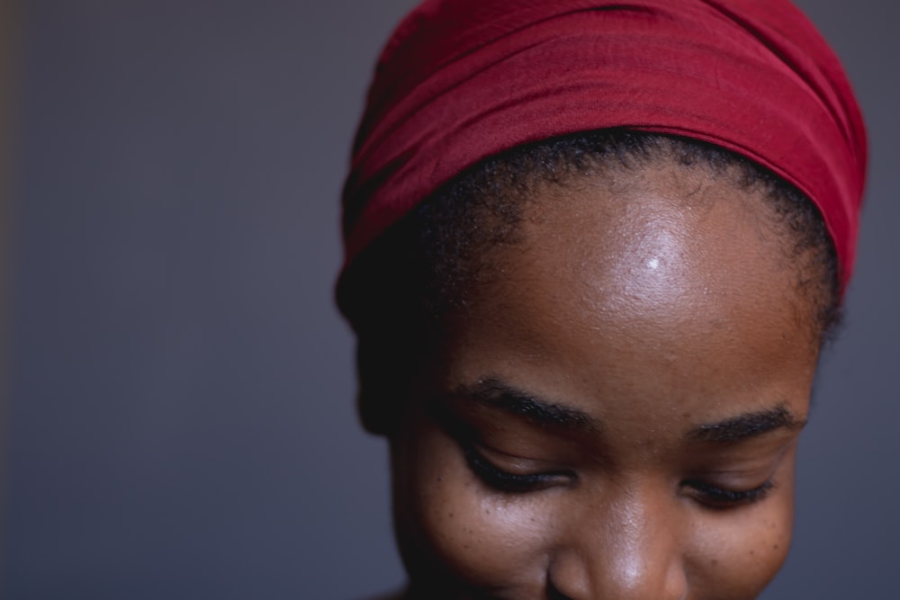 woman in red knit cap