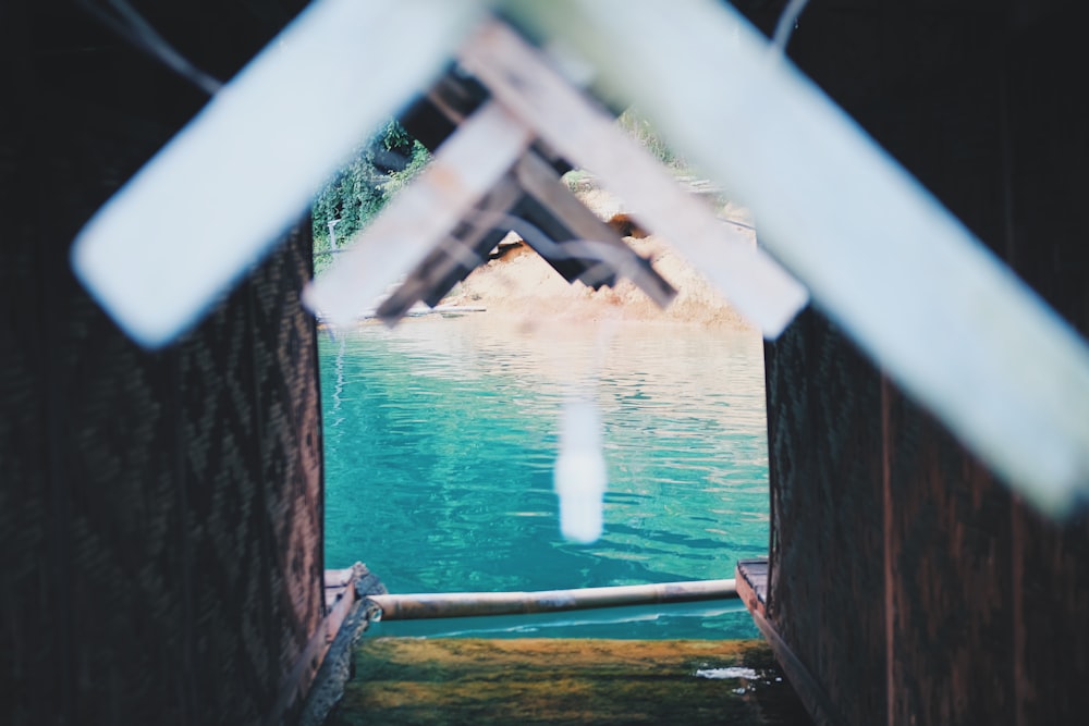 brown wooden bridge over water