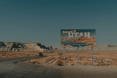 a large sign on the side of a road
