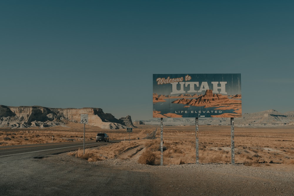 a large sign on the side of a road