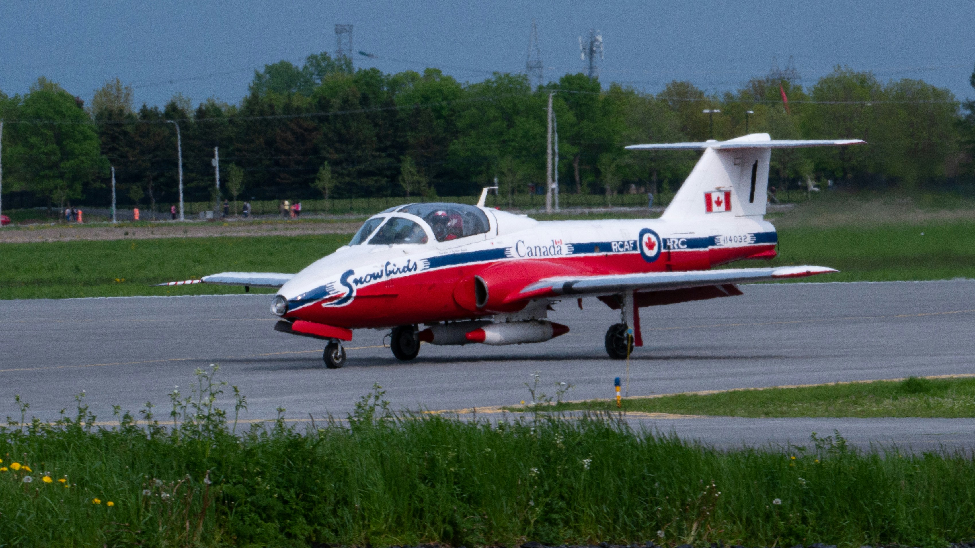 red and white airplane on airport during daytime, Canadian Snowbird during Airshow