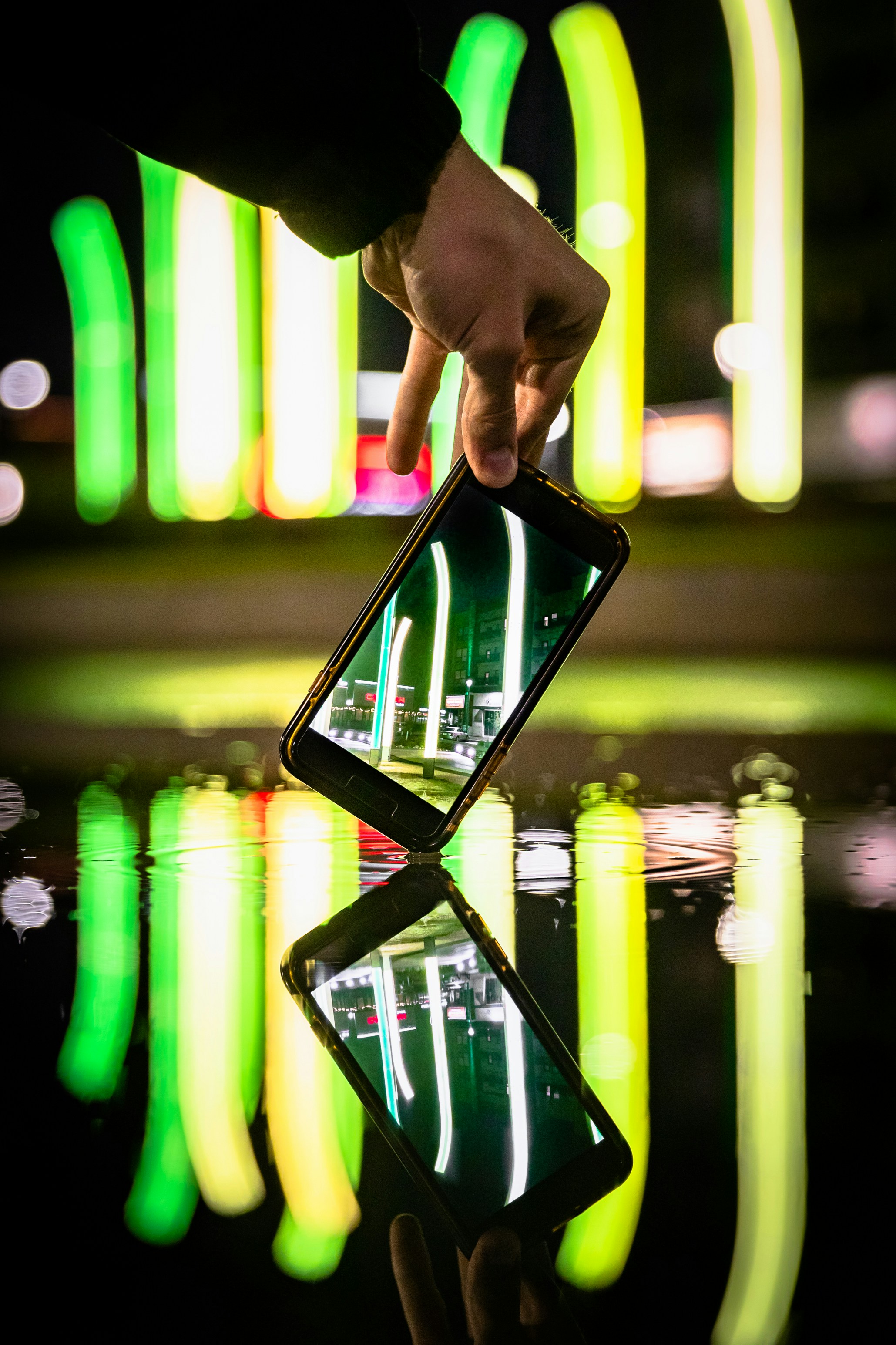 person holding black tablet computer