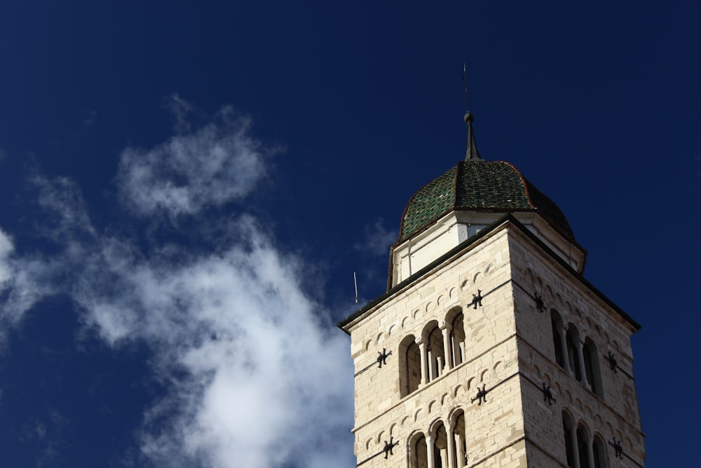 brown concrete building under blue sky