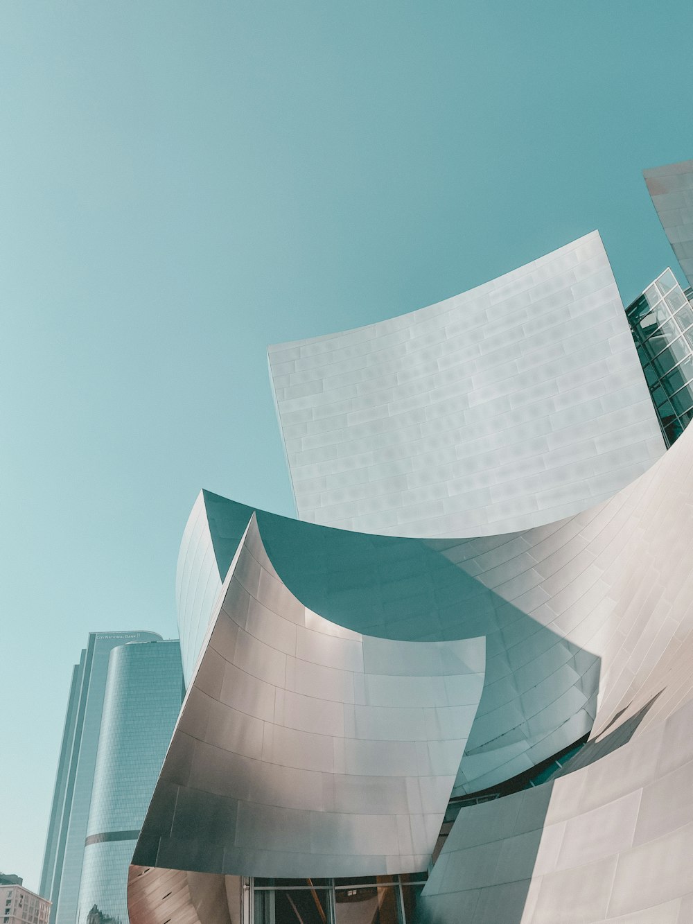 white concrete building under blue sky during daytime