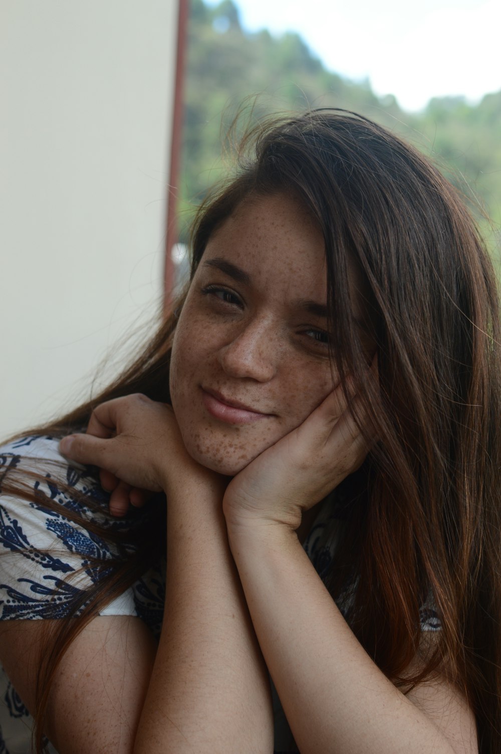 woman in white and blue shirt