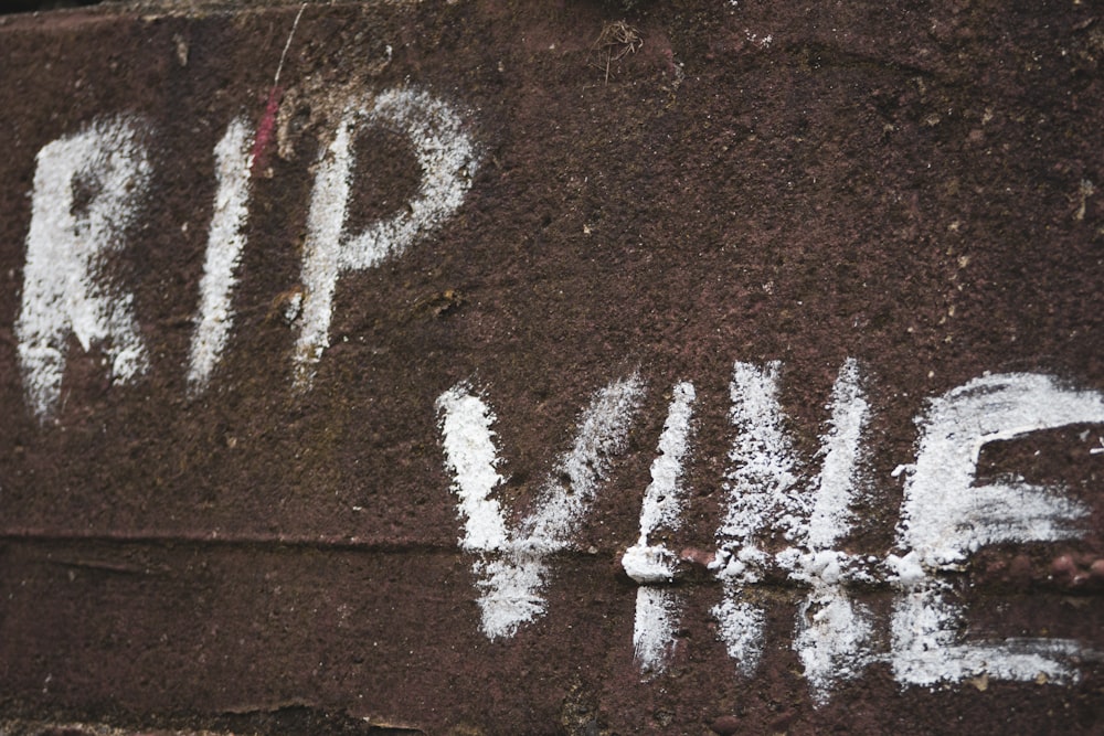 text on brown concrete floor