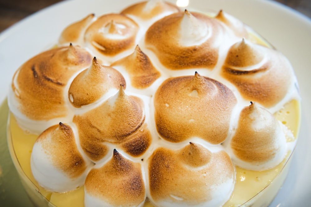 brown and white icing covered cake