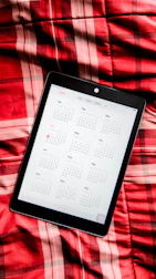 A colorful editorial calendar displayed on a digital tablet.