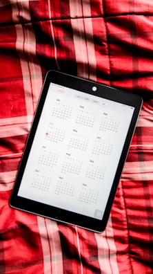 A digital tablet displaying an online appointment booking interface.