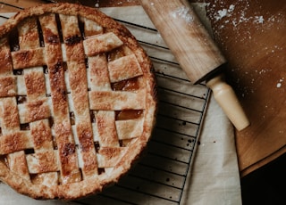 brown pie on brown wooden table