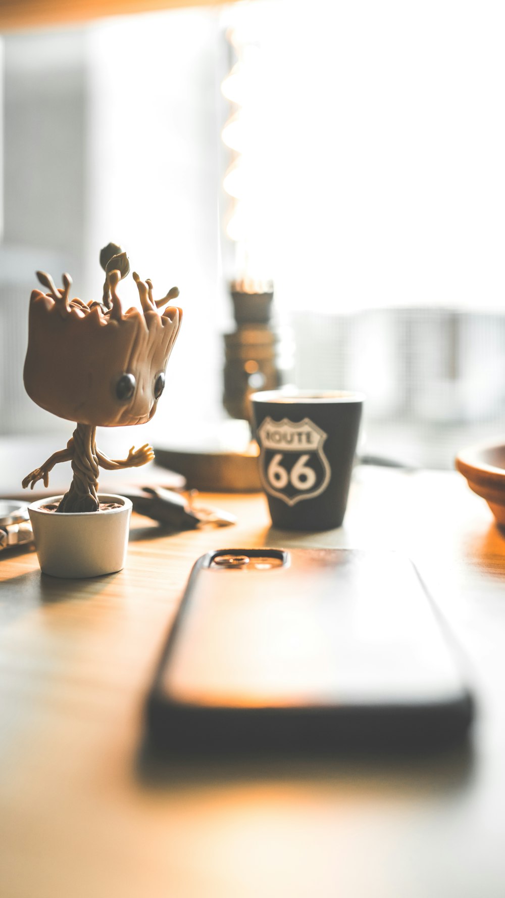 brown wooden animal figurine on brown wooden table