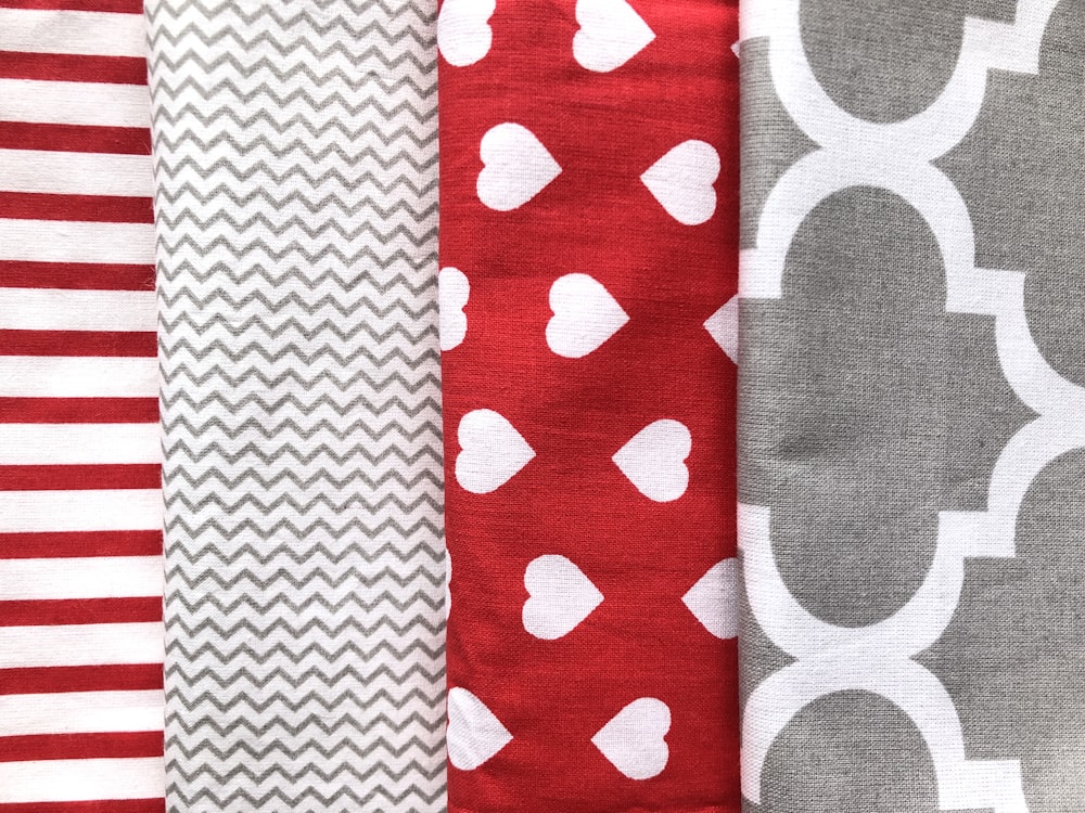 red and white polka dot textile