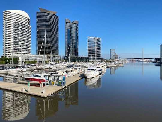 white and gray boats on body of water during daytime in Docklands, Victoria Australia