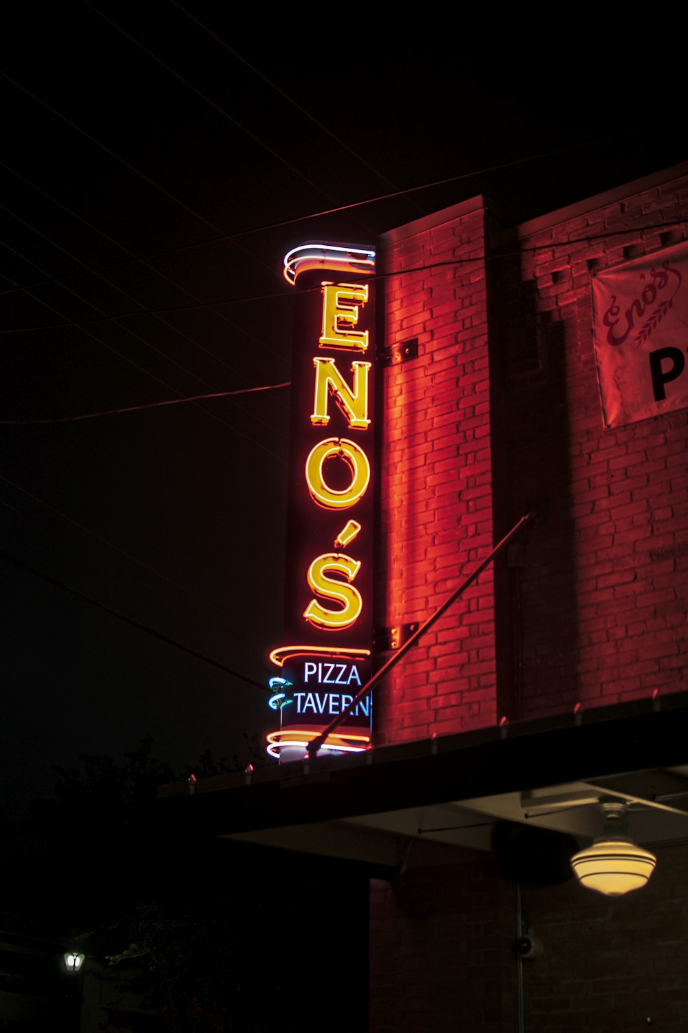 red and white UNKs neon light signage