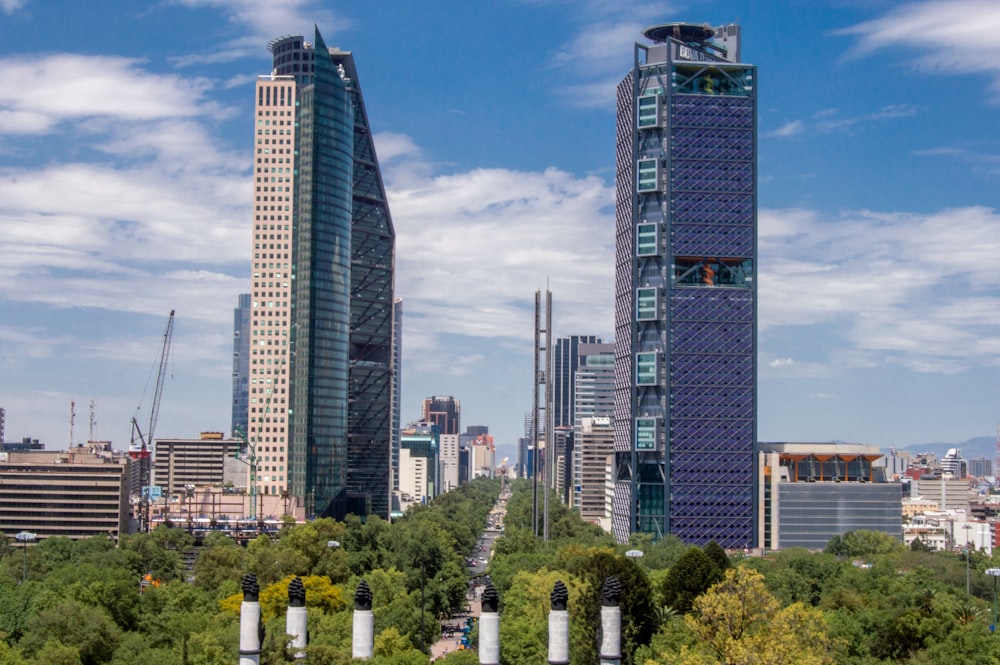 city buildings under blue sky during daytime