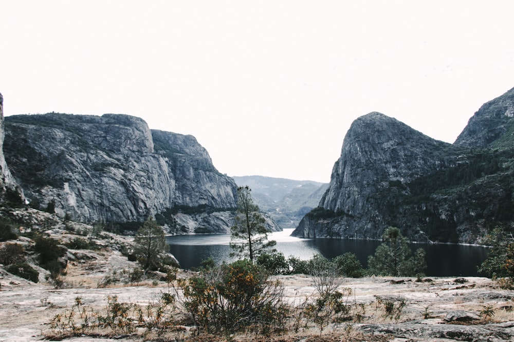 lake in the middle of mountains