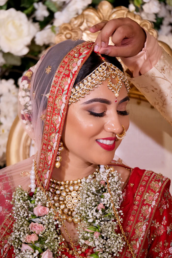Close-up bridal jewellery and makeup detail