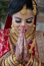 woman in red and gold traditional dress