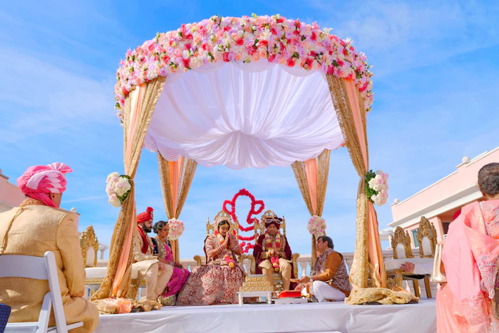 Guests celebrating at an Asian wedding reception