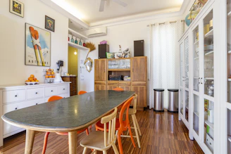 brown wooden table and chairs
