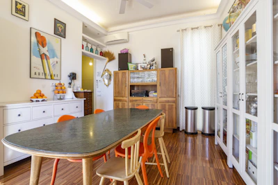 brown wooden table and chairs