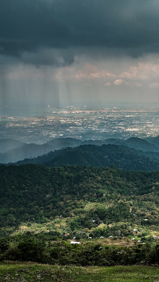 green mountains under white clouds during daytime in Cebu City Philippines