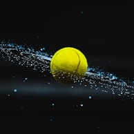 yellow ball on water during night time