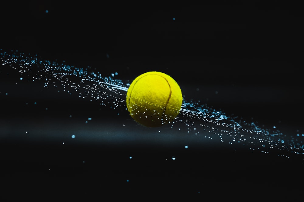 yellow ball on water during night time