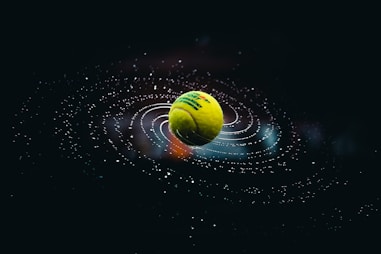 green and yellow ball on water