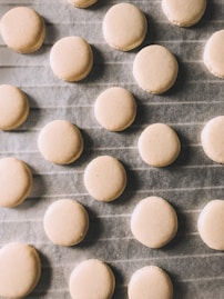 white round food on gray surface