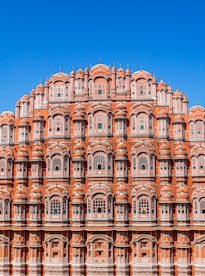 brown concrete building under blue sky during daytime