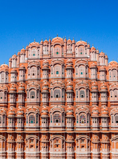 brown concrete building under blue sky during daytime