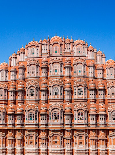 brown concrete building under blue sky during daytime