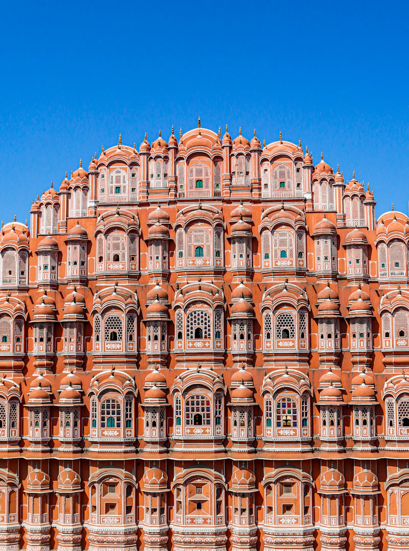 The pink sandstone facade of Hawa Mahal in Jaipur, Rajasthan