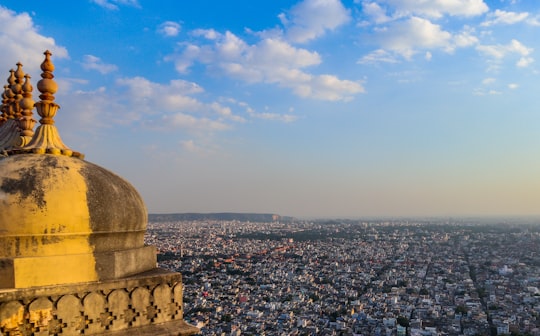 brown concrete building under blue sky during daytime in Nahargarh Fort India