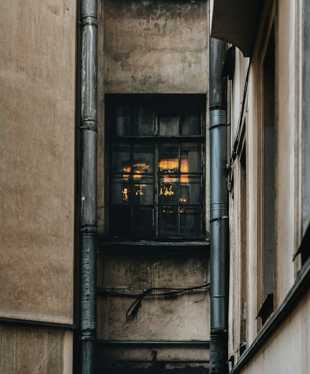 black metal framed glass window