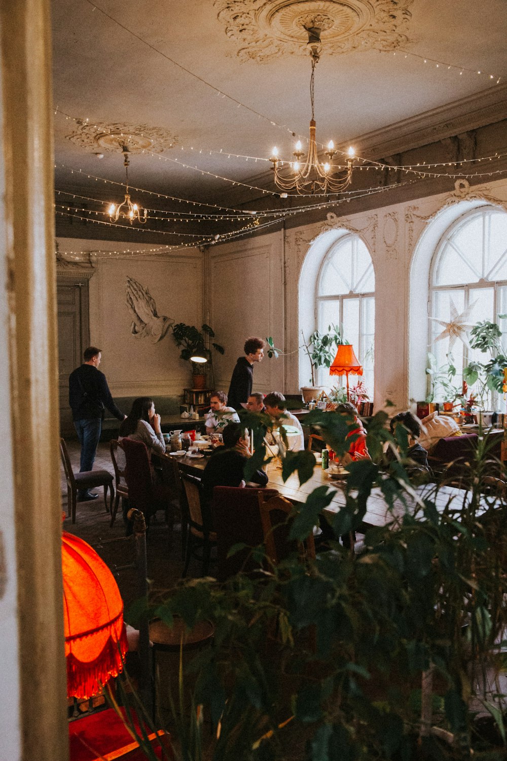 people sitting on chairs inside room