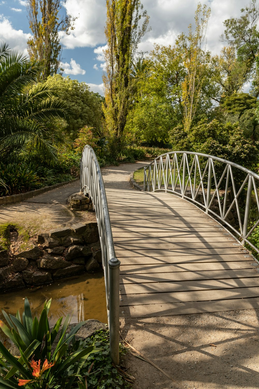 white metal bridge over river