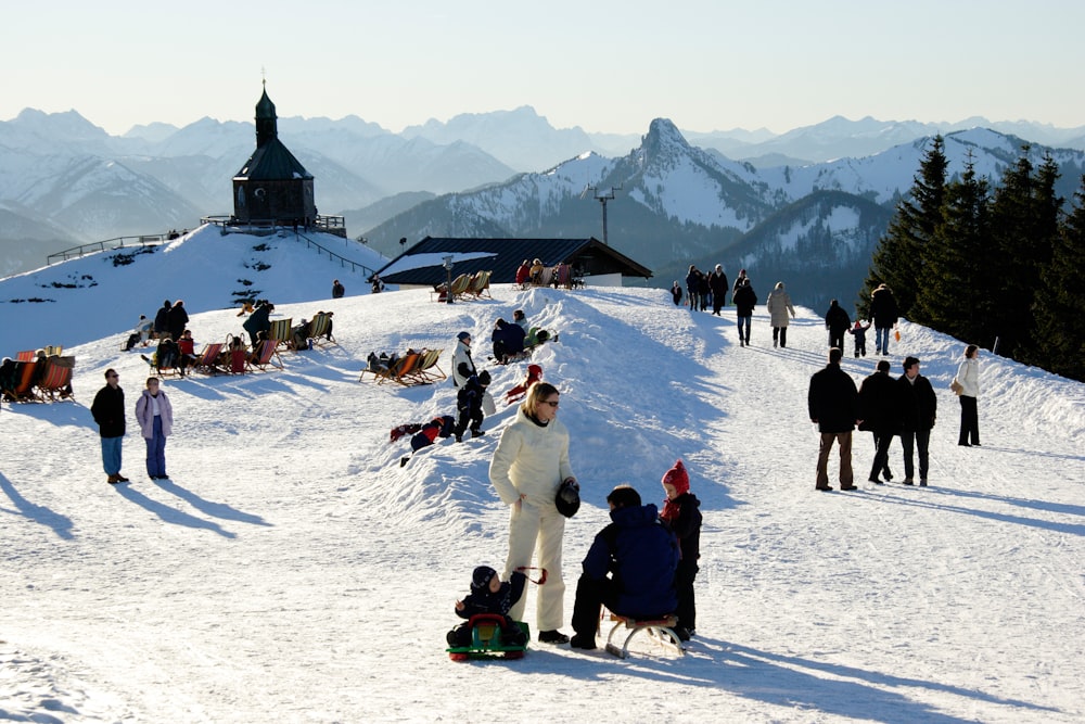 people on snow covered ground during daytime