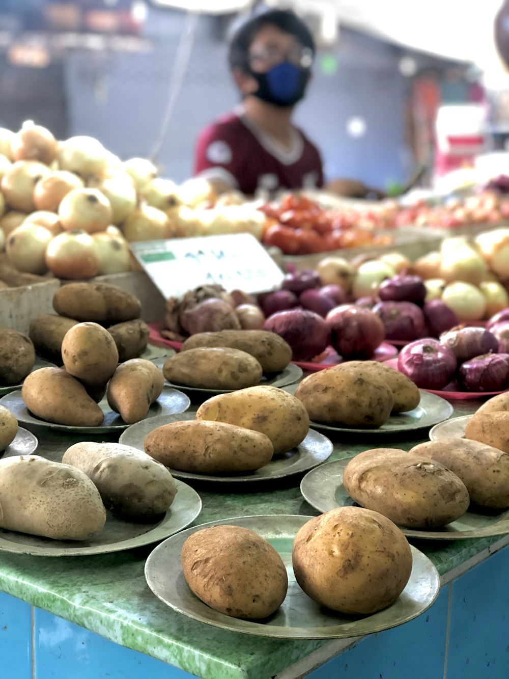 brown round fruits on white ceramic plate