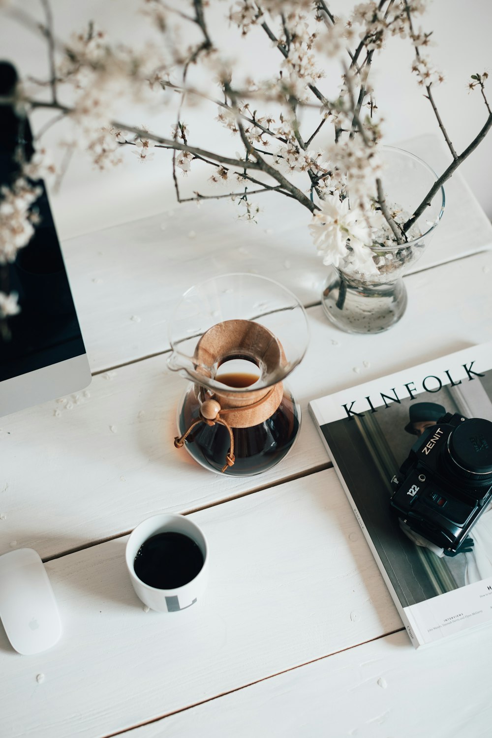 brown ceramic mug on white table