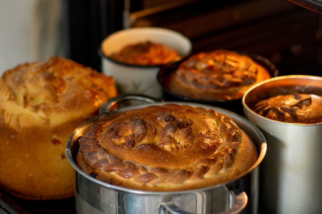 baked pie on stainless steel bowl