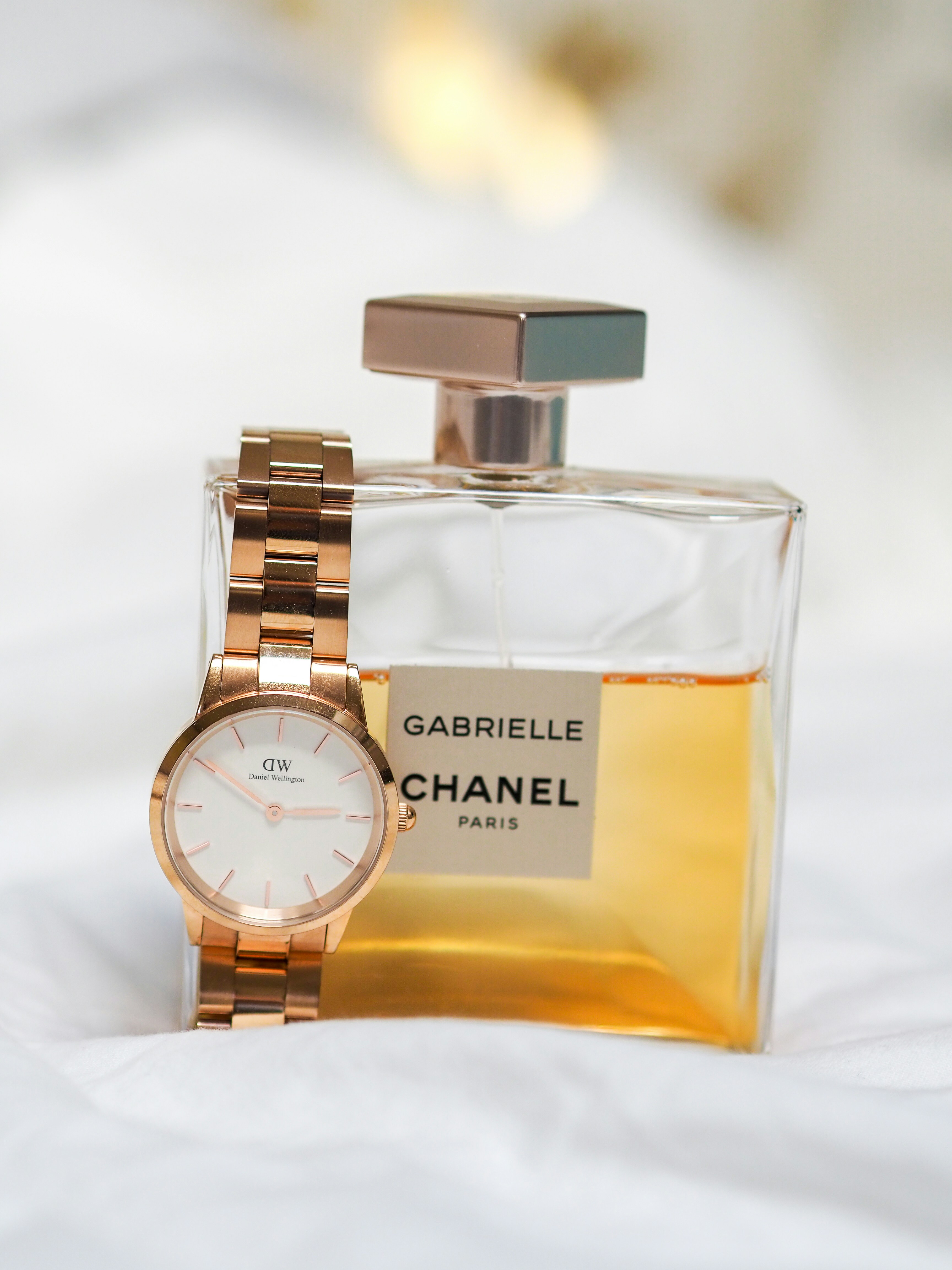 gold and white analog watch