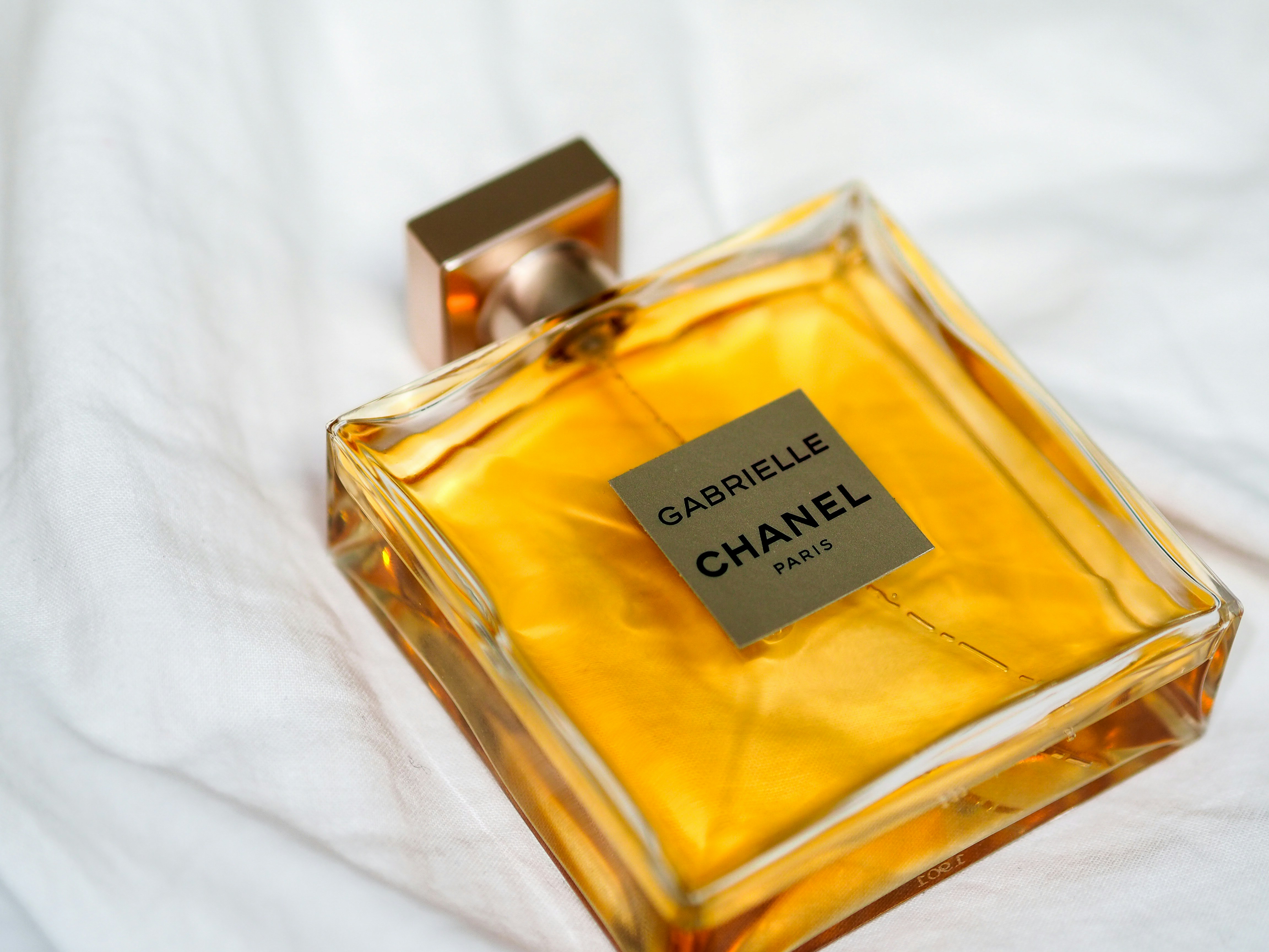 Download Clear Glass Perfume Bottle With Yellow Liquid Photo Free Bottle Image On Unsplash Yellowimages Mockups